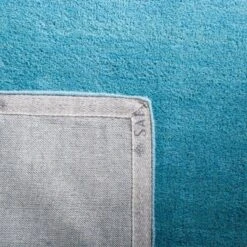 Mandy Solid Tufted Rug - Safavieh -Decor Vista GUEST 21f4f61a 8789 415a ac3b 806e4c8e405e