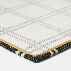 1'6"x2'6" Indoor/Outdoor Plaid Scatter Halloween Doormat Black/White - Hyde & EEK! Boutique™ -Decor Vista GUEST 61fba789 c646 4b6a 8307 45e32a6f8042