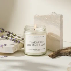 Sweet Water Decor Teakwood And Mahogany 9oz Clear Jar Soy Candle