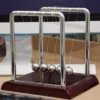 Juvale Newton's Cradle Balance Pendulum, Pendulum Balls Physics Learning Desk Toy For Home And Office, 7x6x7 In -Decor Vista GUEST d9780b60 1500 4375 8a97 664610d7f89a